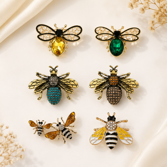 Golden Wings brooches